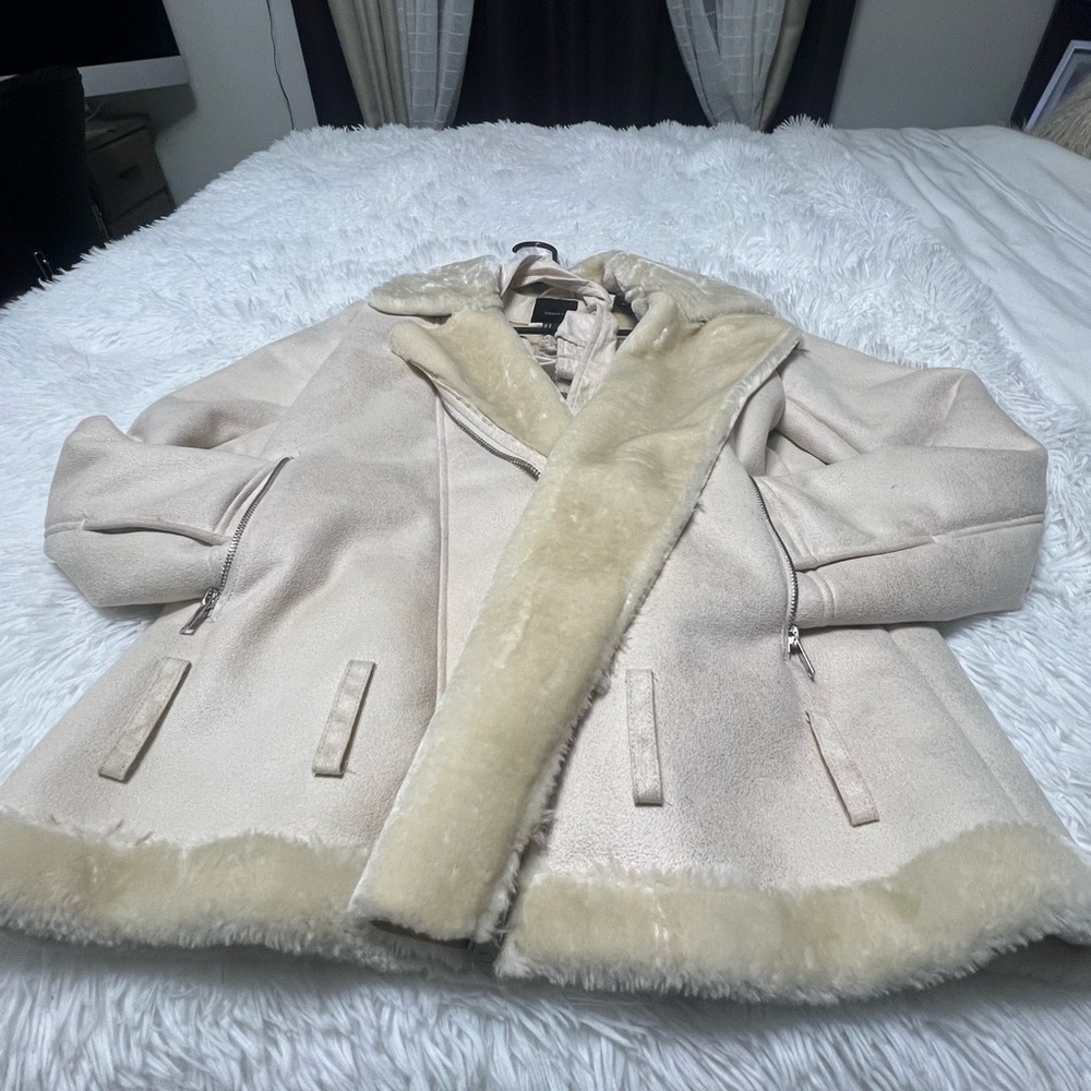 Very very warm faux furry coat